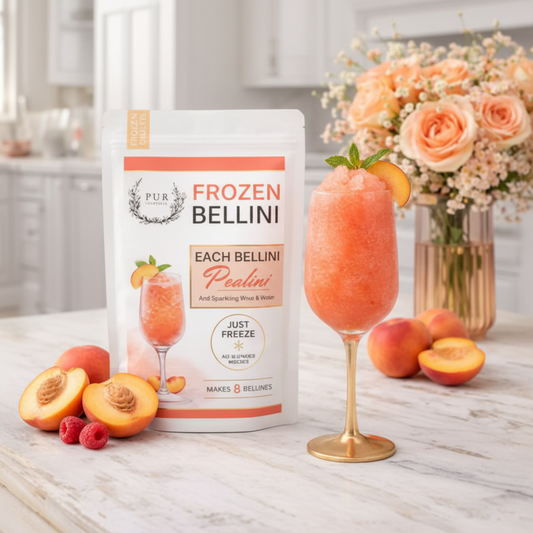 PUR Cocktails Peach Bellini - branded pouch with peach bellini drink on marble countertop
